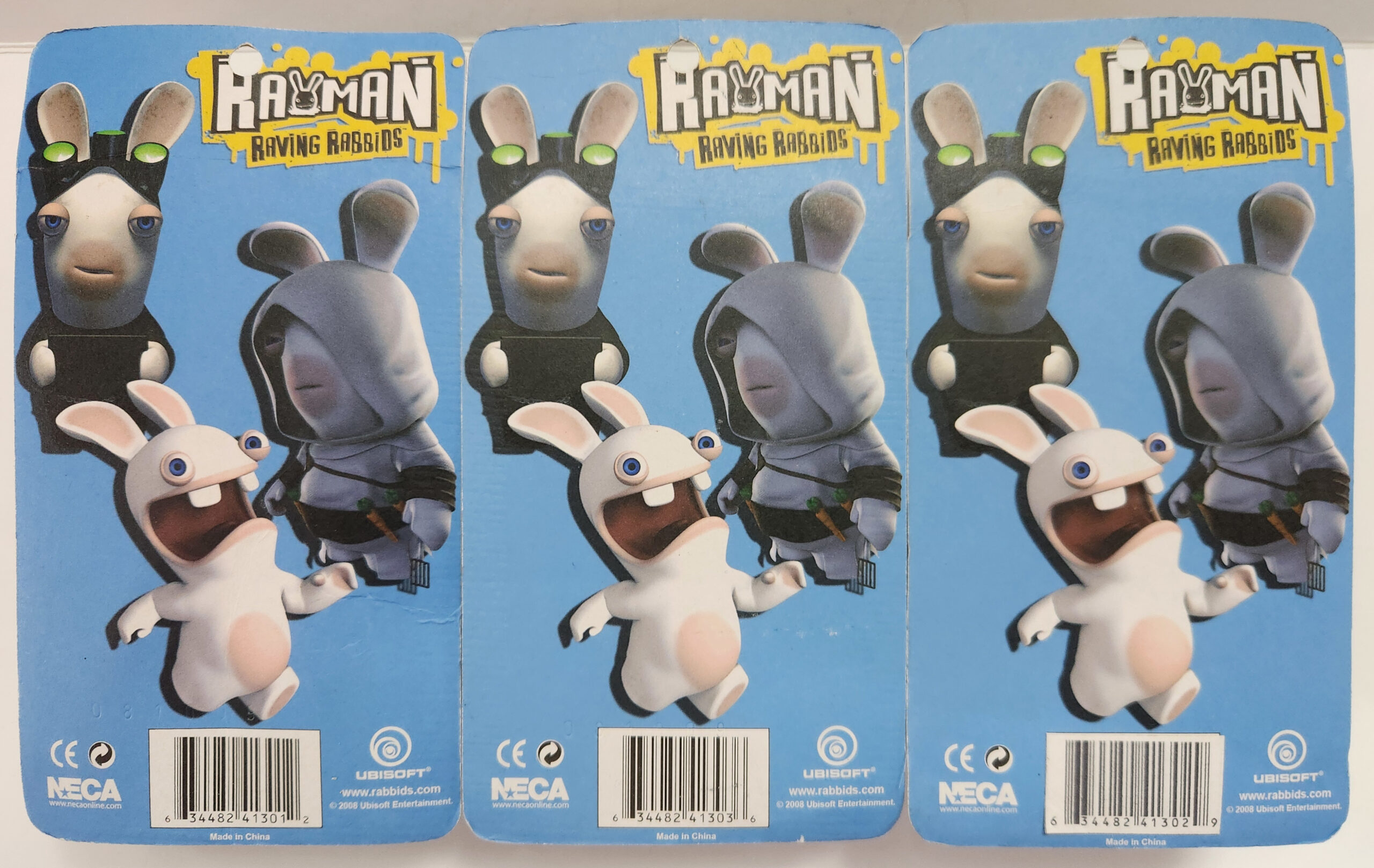 2008-neca-rayman-raving-rabbids-full-set-of-3-action-figures-mint-on-card-2 2008 Neca Rayman Raving Rabbids Full Set of 3 Action Figures - Mint on Card